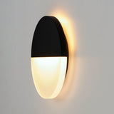 Alumilux Glow Outdoor Wall Sconce - Black Lifestyle w/ lights on